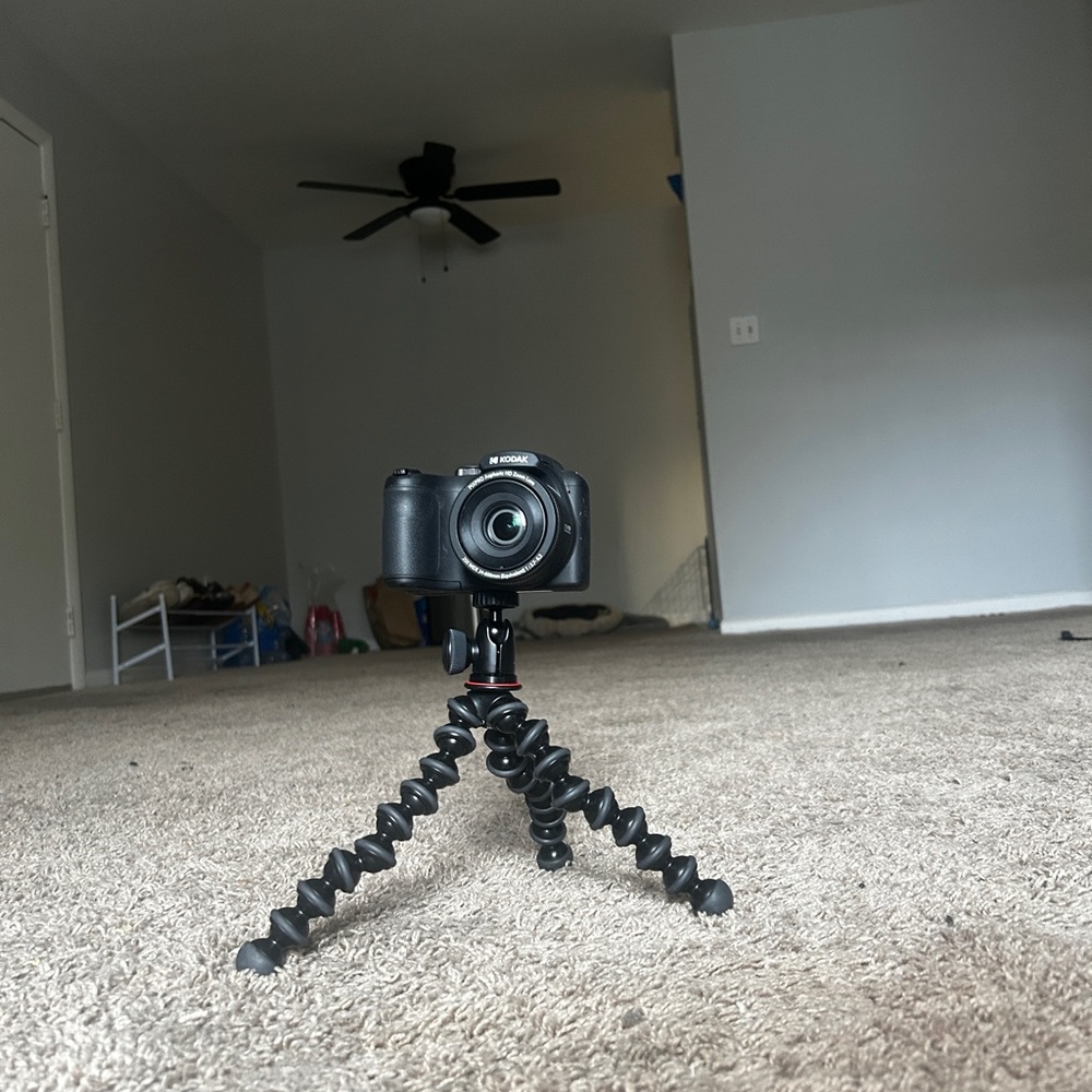 Black Camera with Flexible Tripod